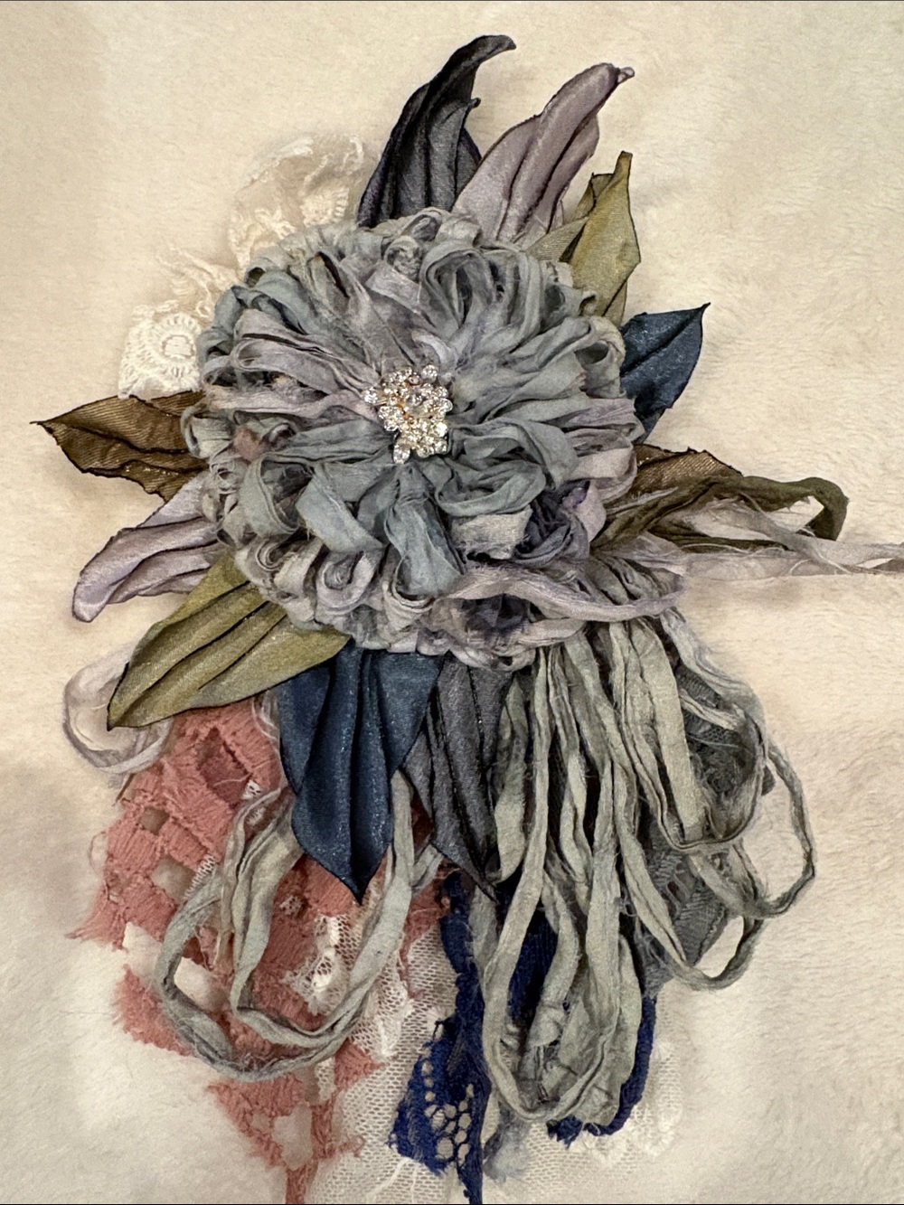 Artisan Gray Floral Fabric Brooch with Rhinestone Center - Metallic Shimmer